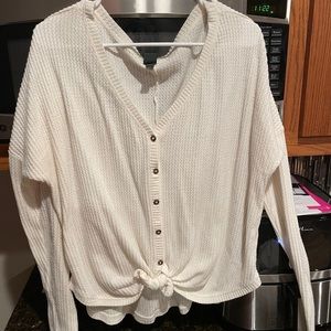 Creamy white button up sweater with knot